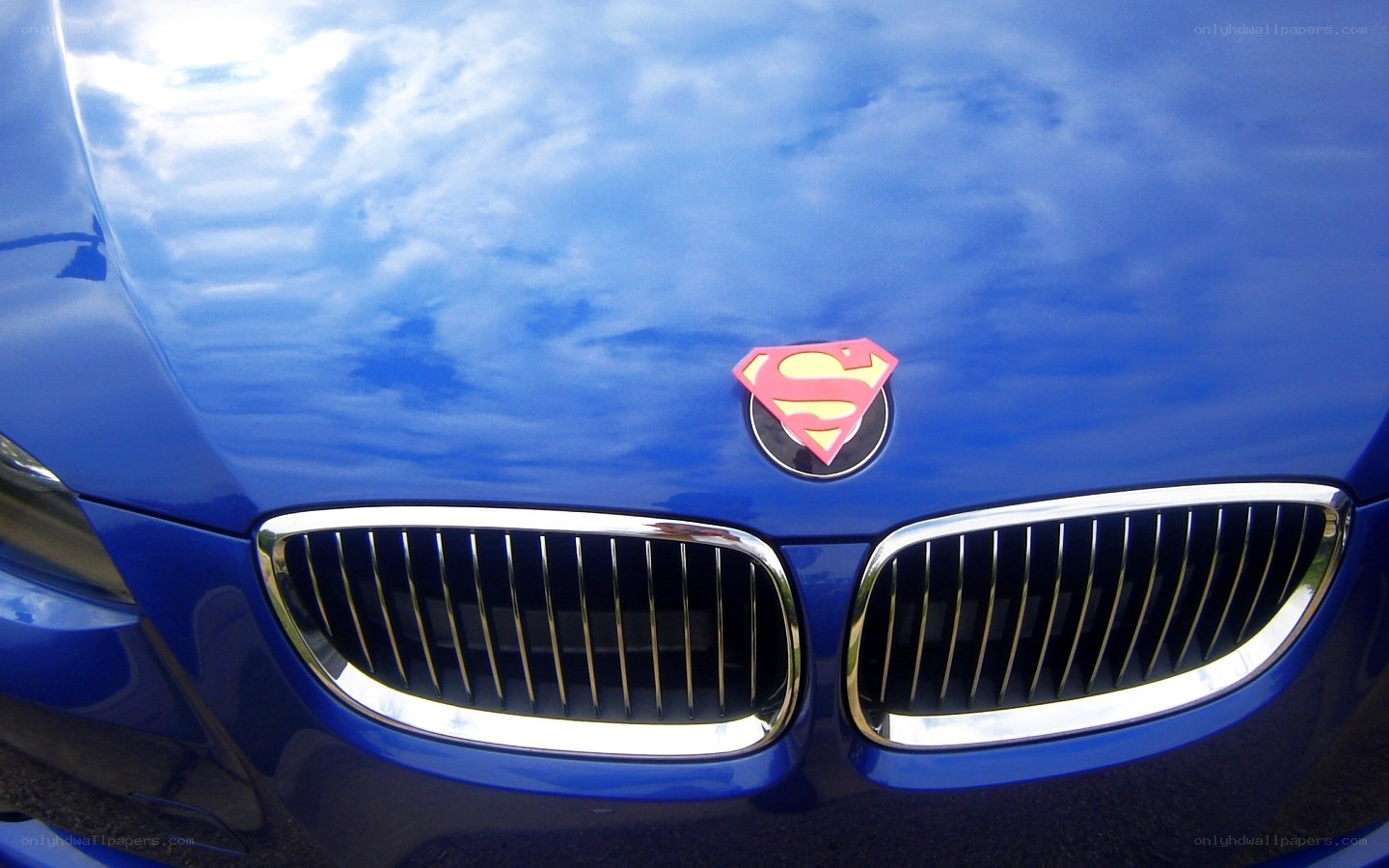 Blue car with Superman emblem