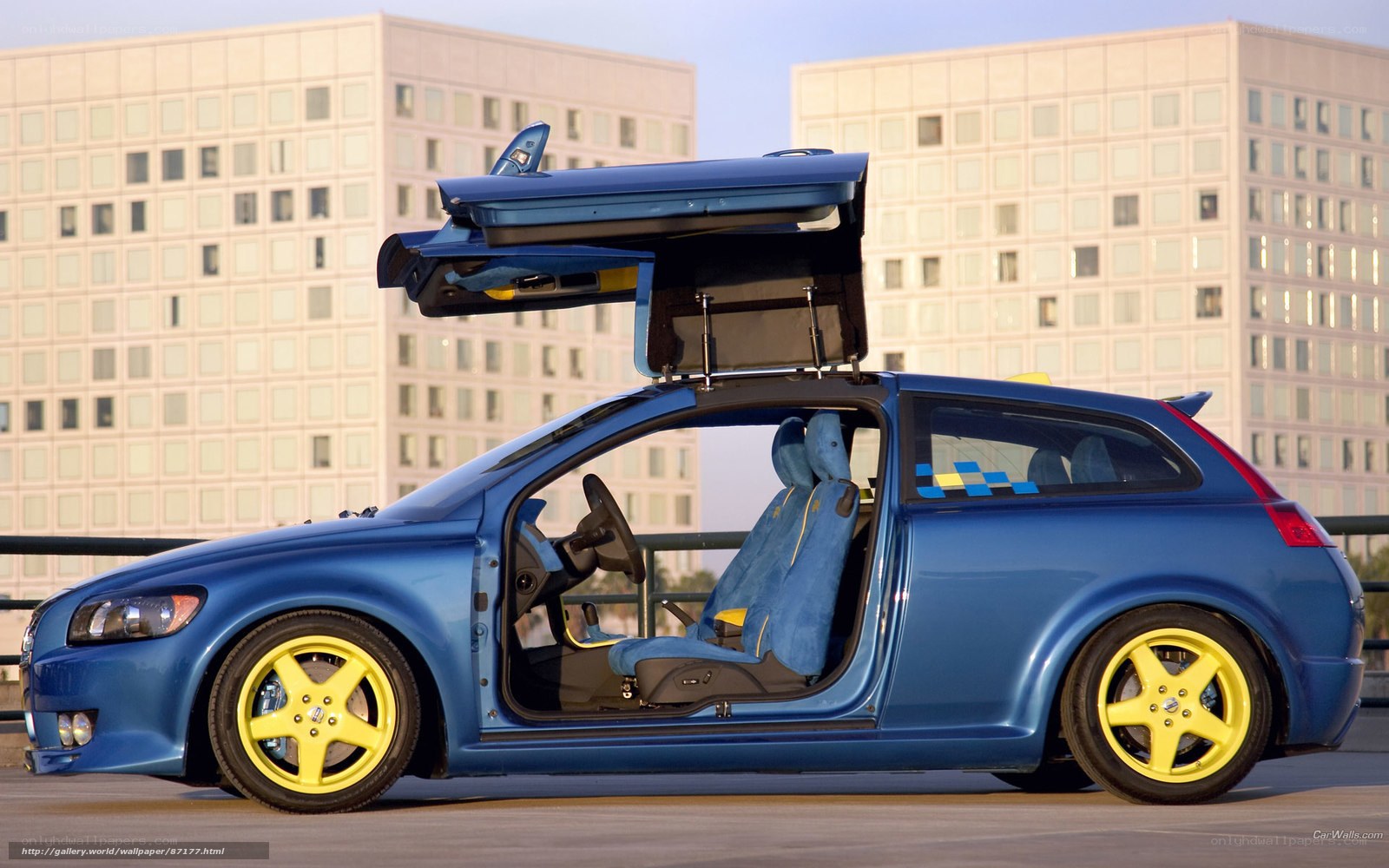 blue car with yellow wheels