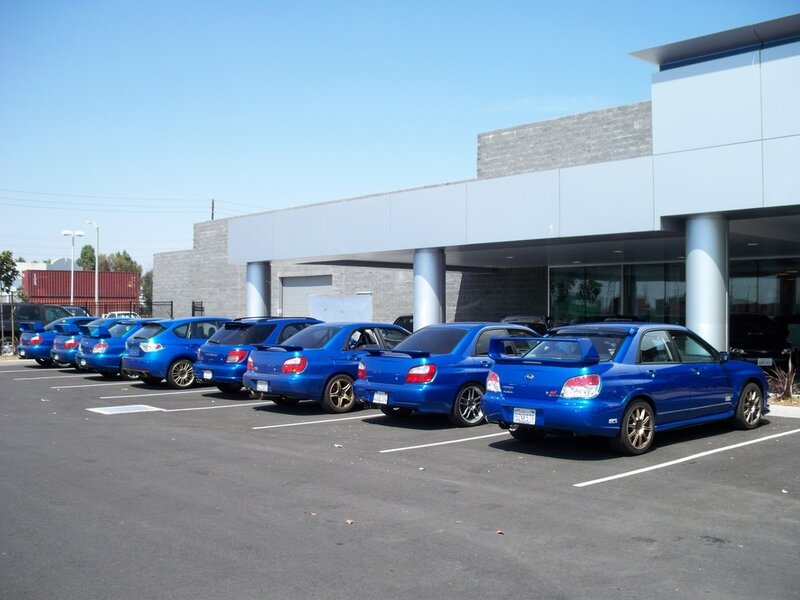 Blue cars in parking lot