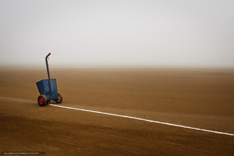 Blue cart on a foggy track