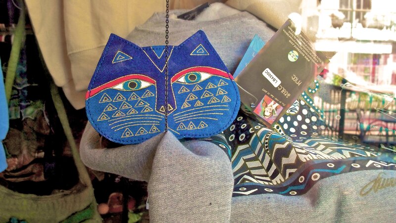 blue cat-shaped pouch with tag