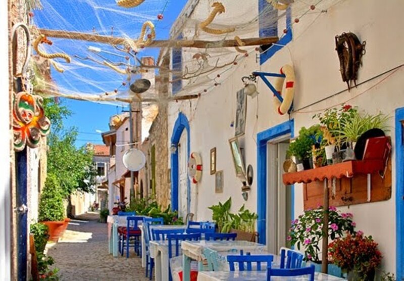 Blue Chairs on Alley