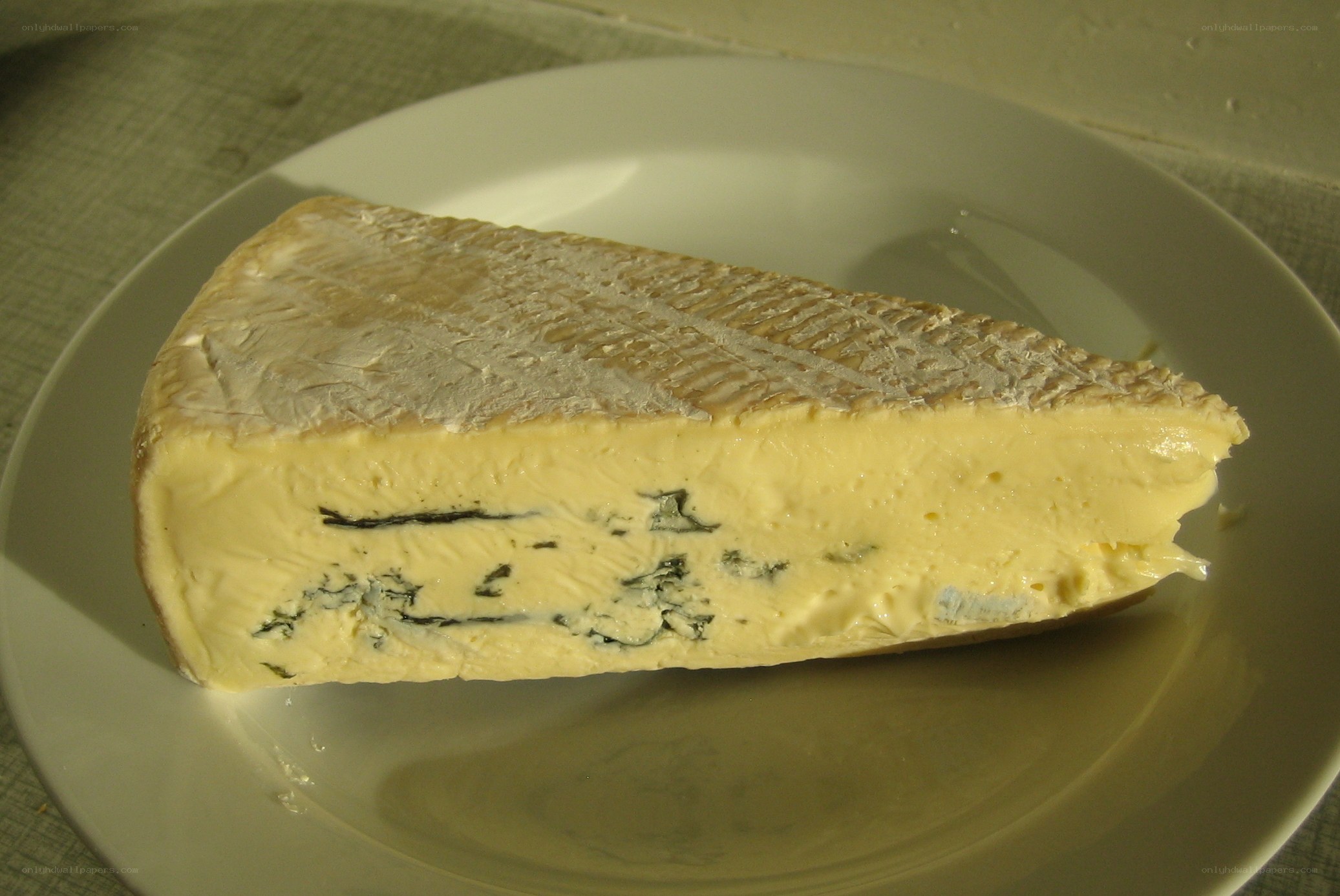 blue cheese wedge on plate