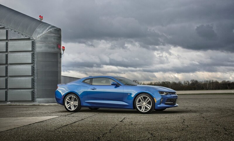 Blue Chevrolet Camaro — Dramatic, Photograph, Building