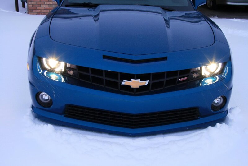 Blue Chevrolet Camaro in snow