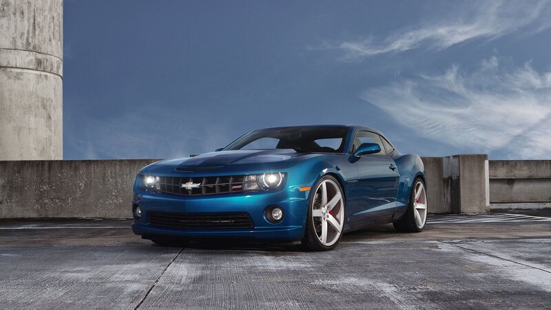 Blue Chevrolet Camaro on rooftop