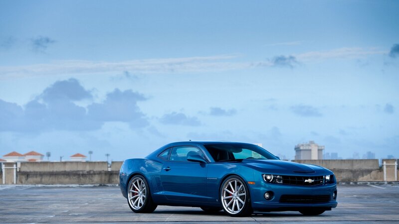 Blue Chevrolet Camaro on rooftop