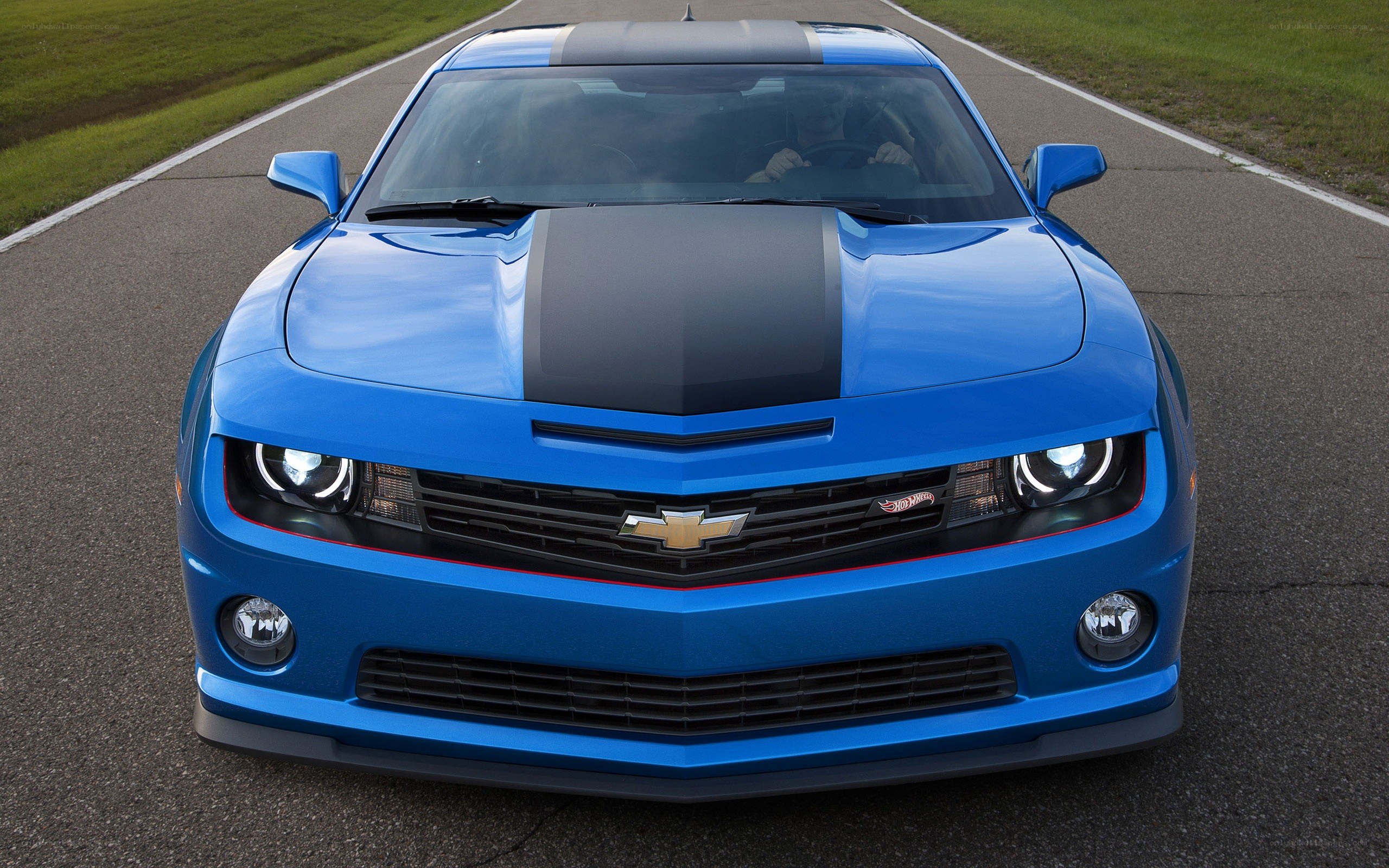 blue chevrolet camaro on track
