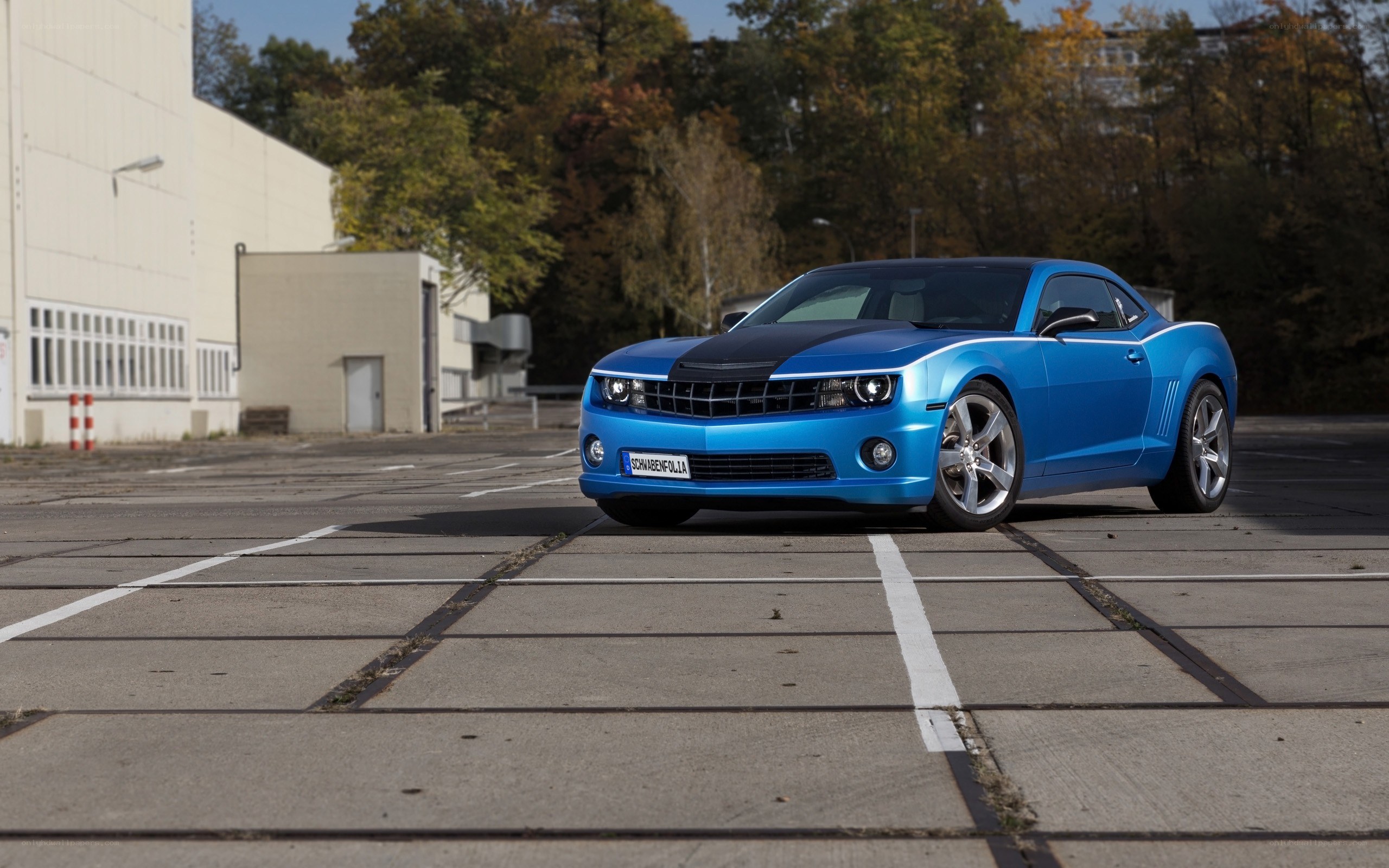 Blue Chevrolet Camaro parked