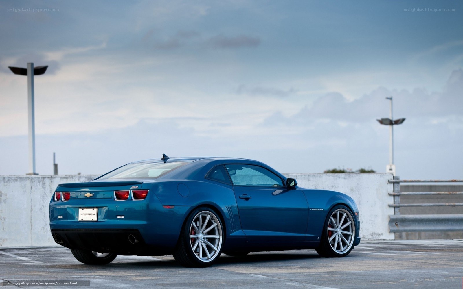 Blue Chevrolet Camaro parked