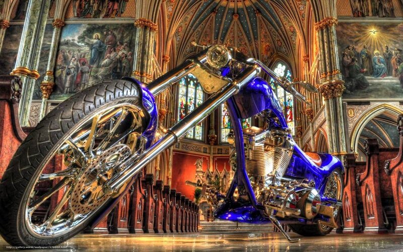 Blue chopper motorcycle in cathedral