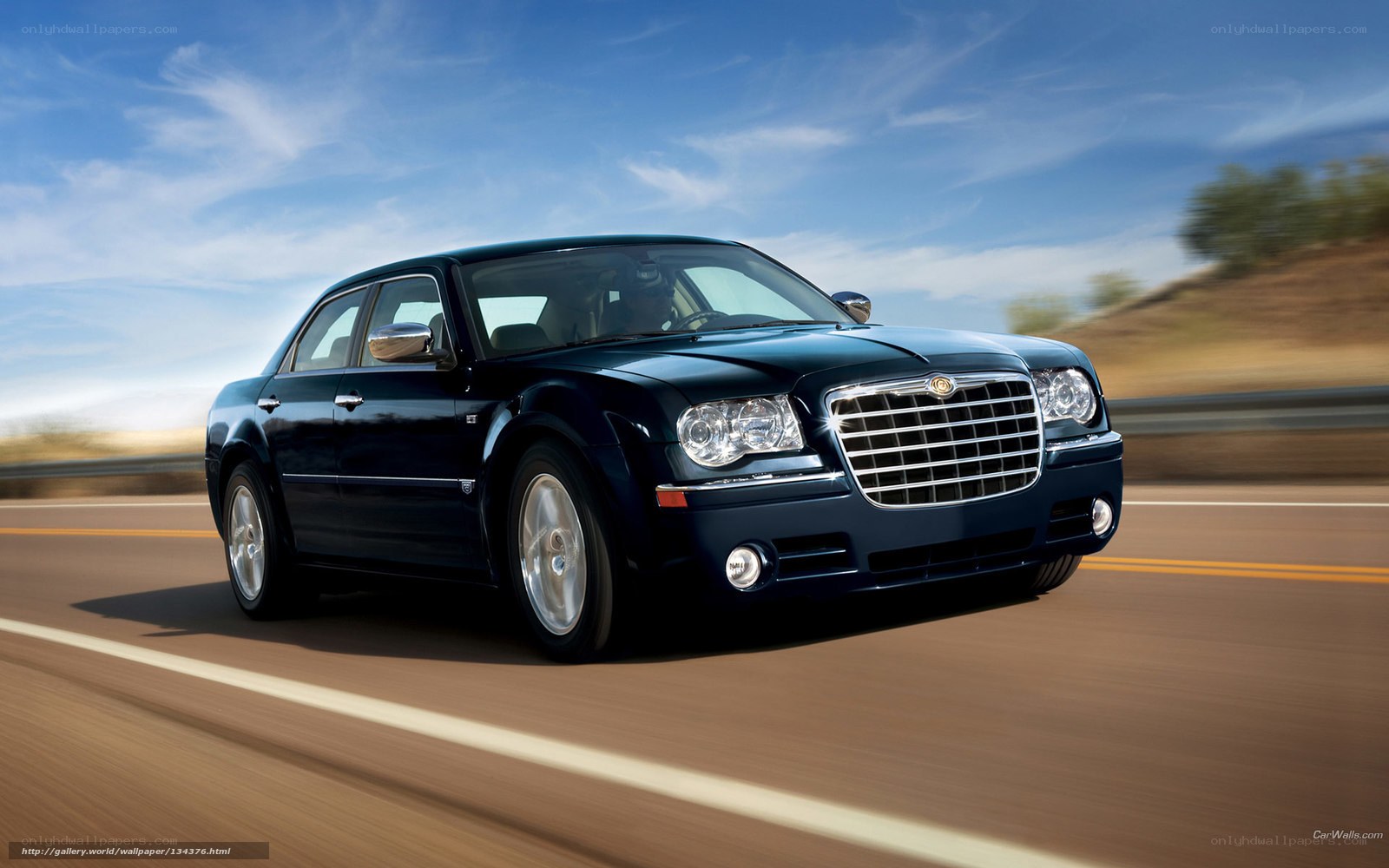 blue chrysler 300 in motion