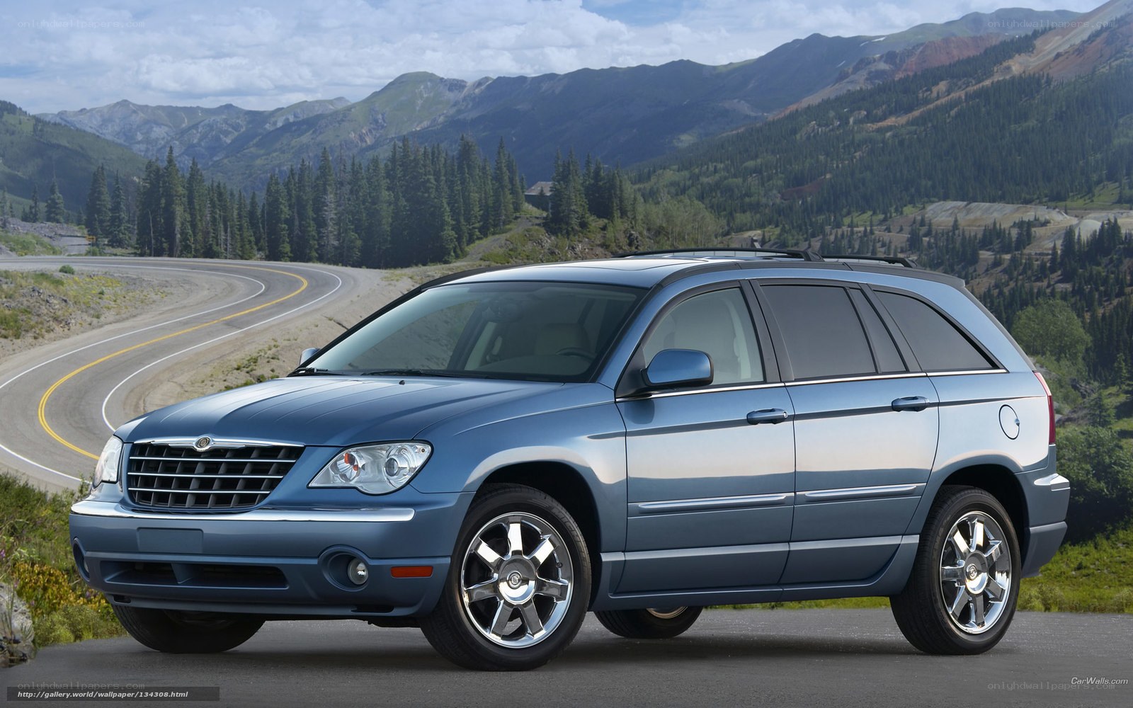 Blue Chrysler Pacifica on mountain road