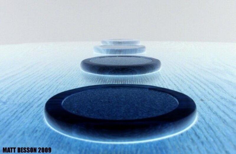 Blue circular objects on wood