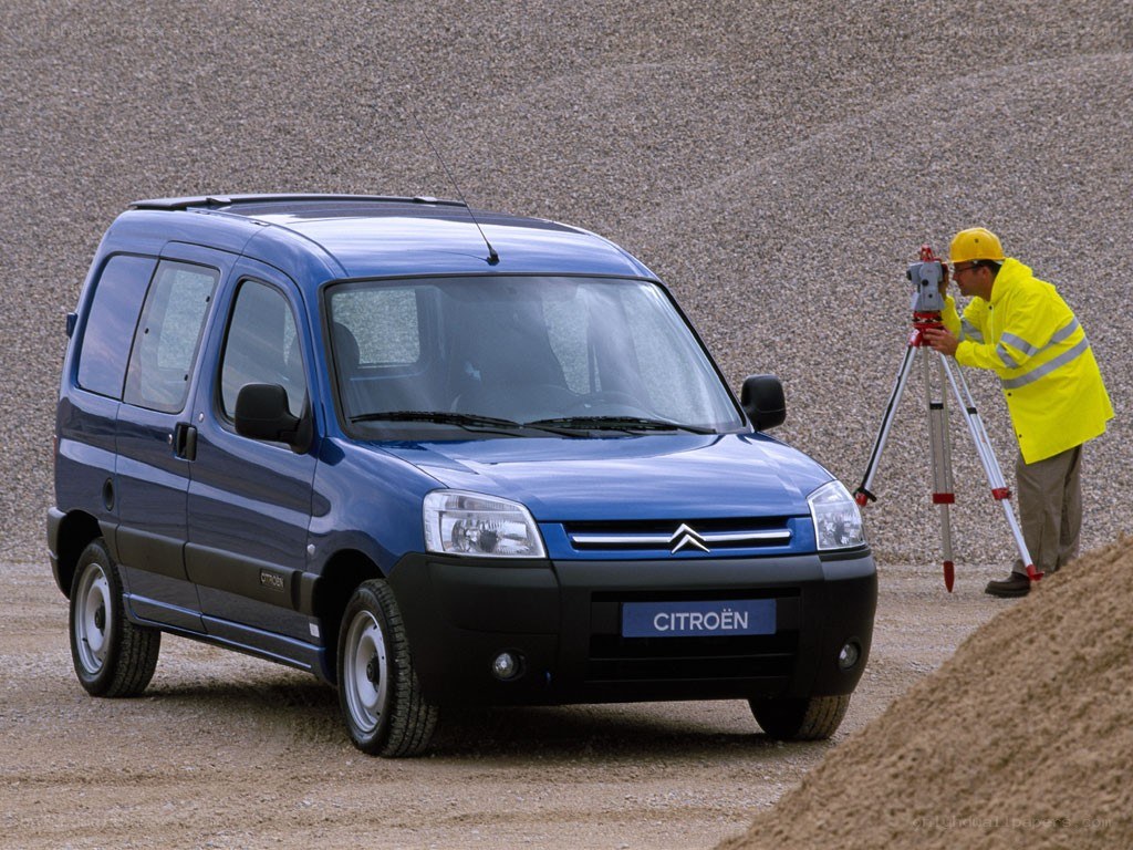 Blue Citroën van with surveyor