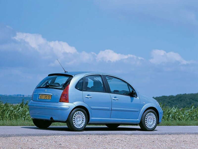 blue citroen c3 on country road