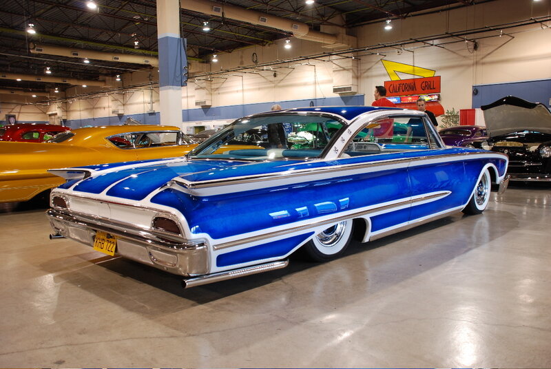 Blue classic car at a show