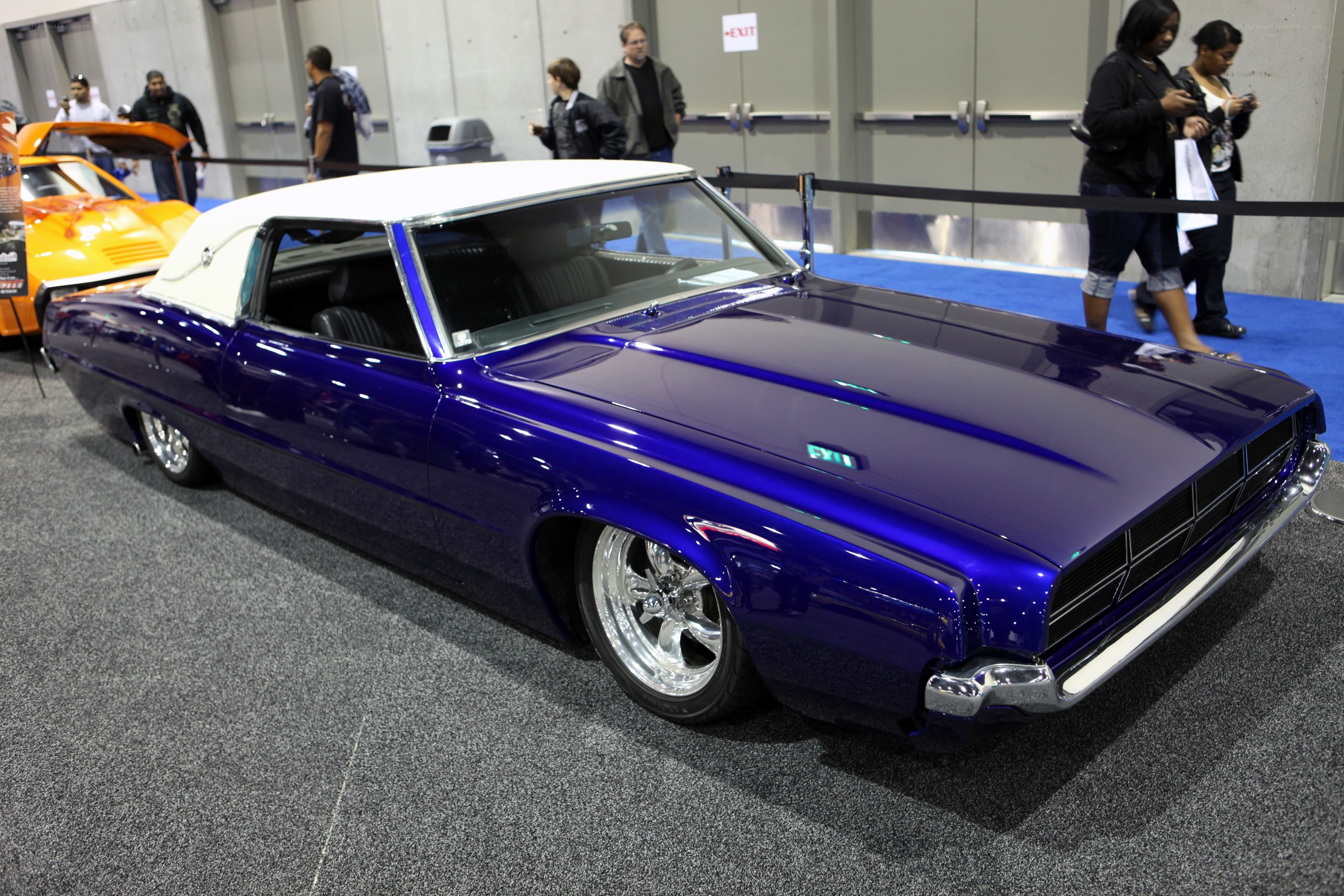 blue classic car at show