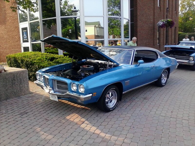 Blue Classic Car — Calm, Afternoon, Photograph, Building, People