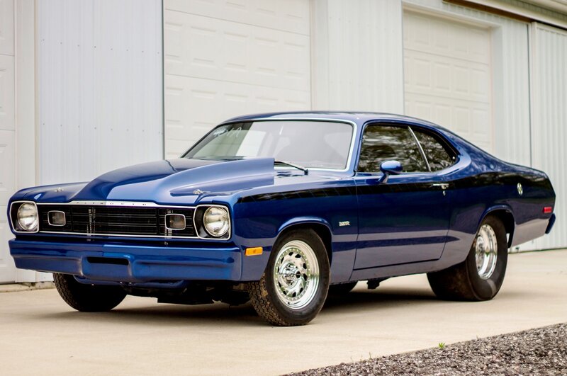Blue Classic Car — Calm, Afternoon, Photograph, Garage Door, Chrome Wheels