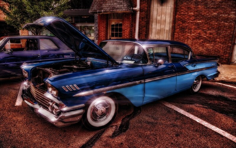 Blue Classic Car — Dramatic, Afternoon, Photograph, Brick Building, Hood Open