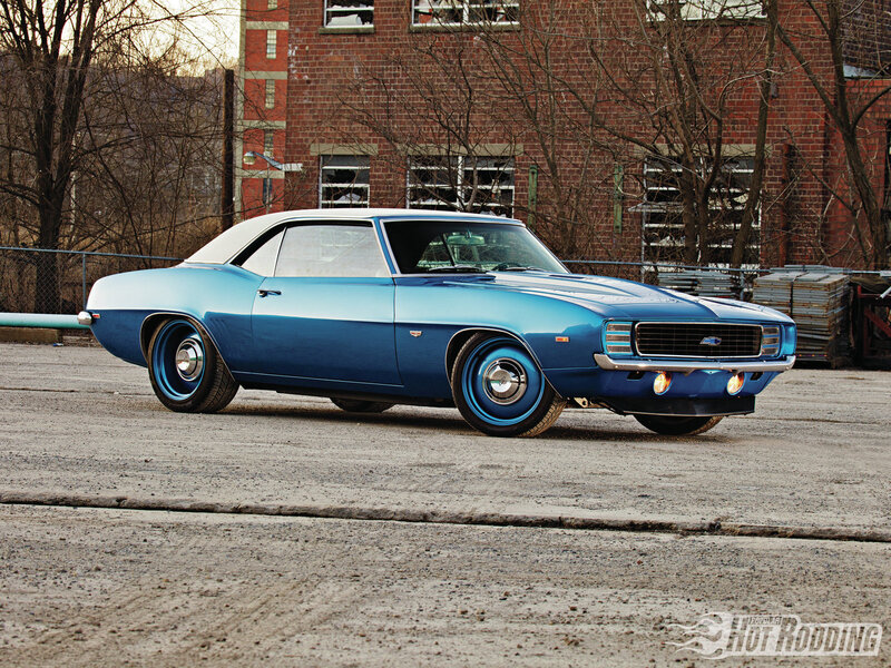 Blue Classic Car — Dramatic, Sunset, Photograph, Brick Building