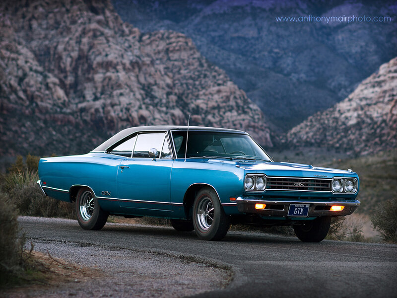 Blue Classic Car — Dramatic, Sunset, Photograph, Mountains, Road