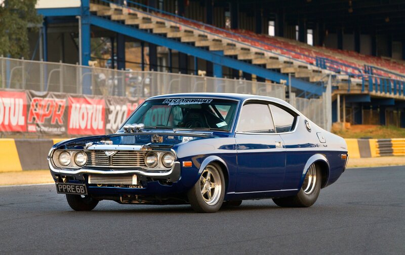 Blue Classic Car — Dynamic, Afternoon, Photograph, Race Track