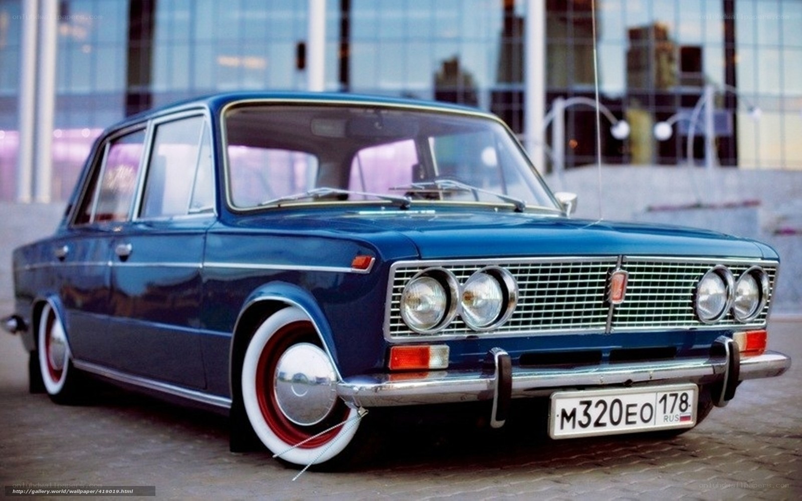 Blue classic car in city