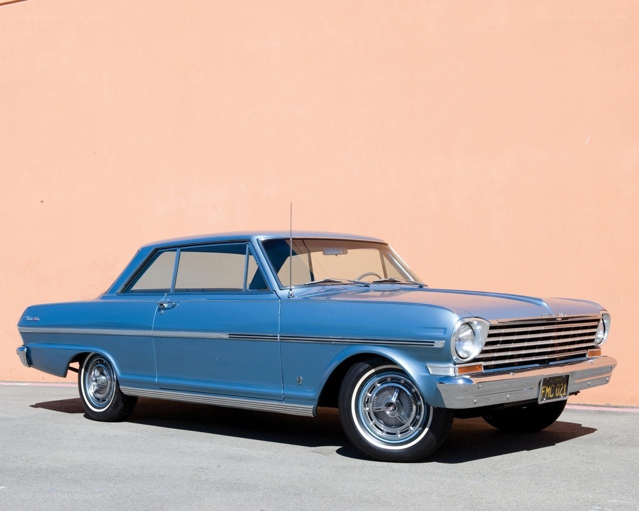 Blue classic car on display