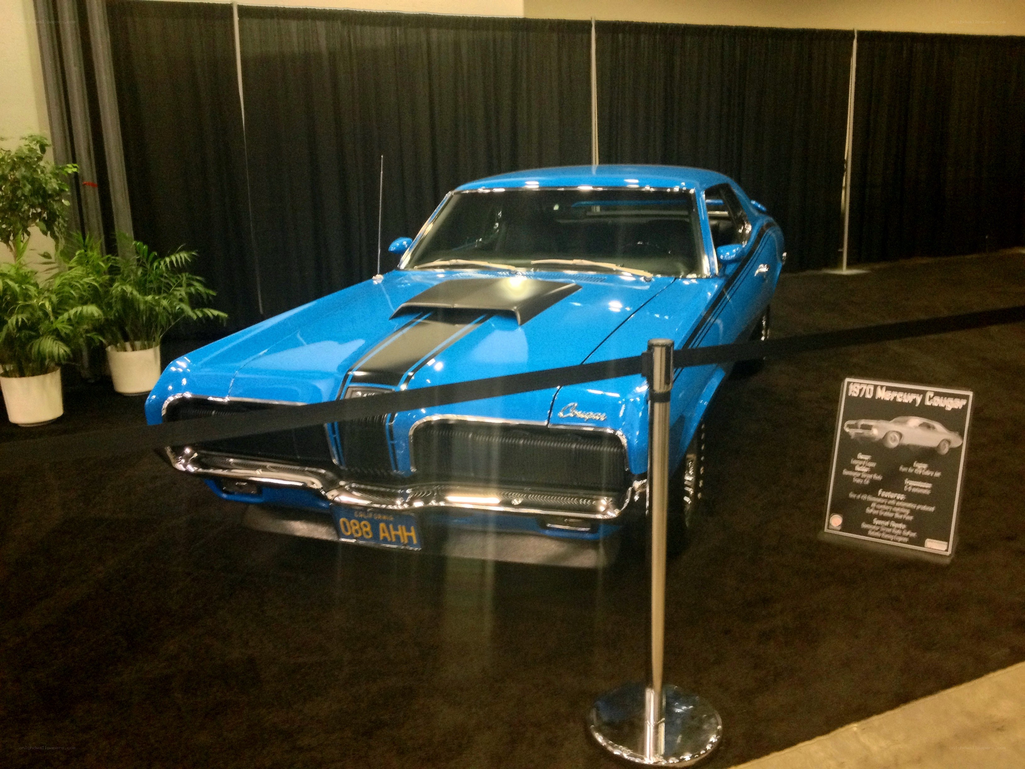 Blue classic car on display