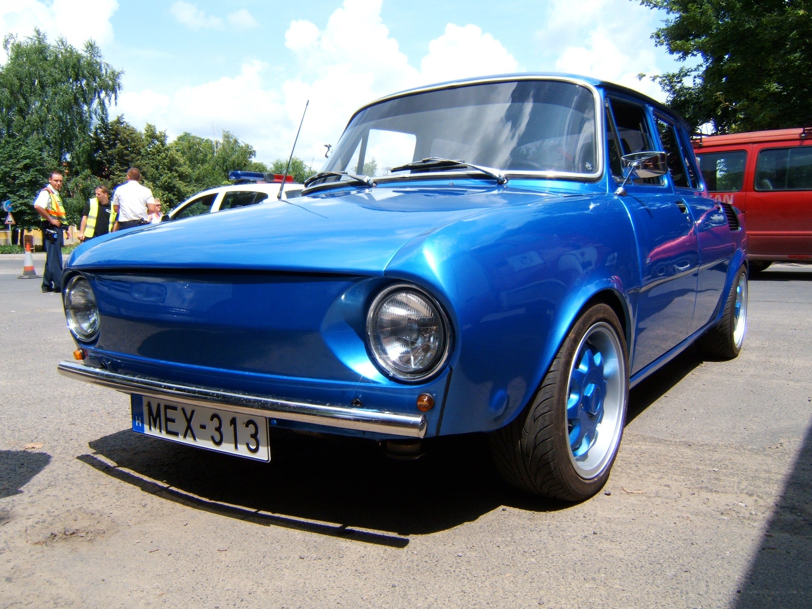 Blue classic car on display