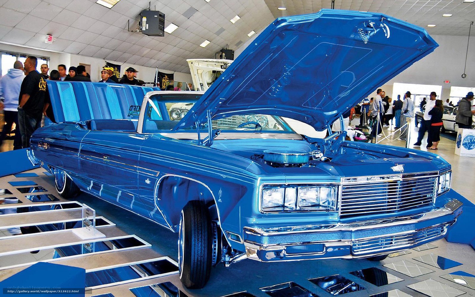 Blue classic car on display