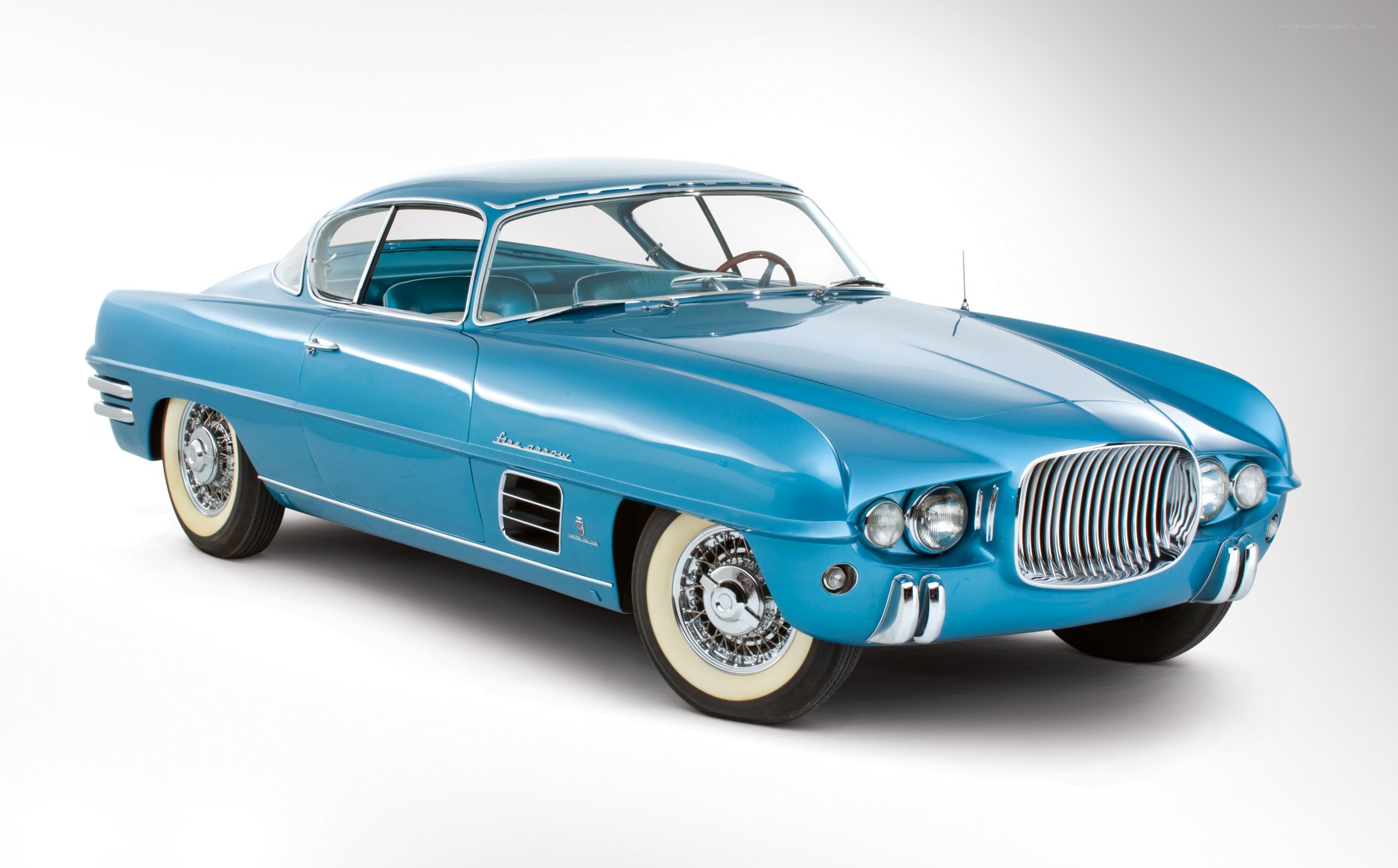 Blue classic car on white background