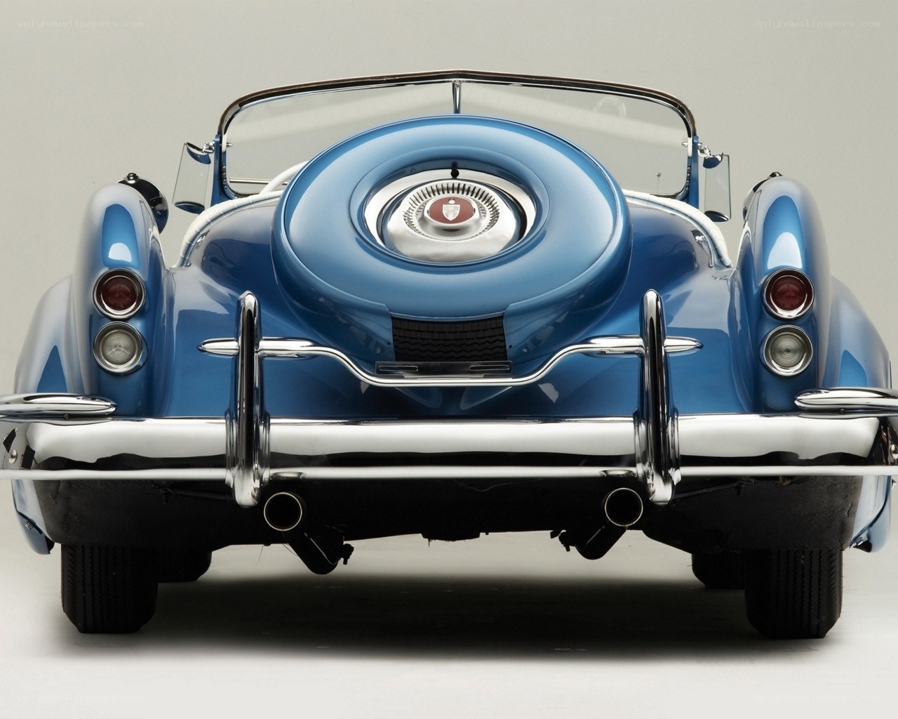 blue classic car rear view