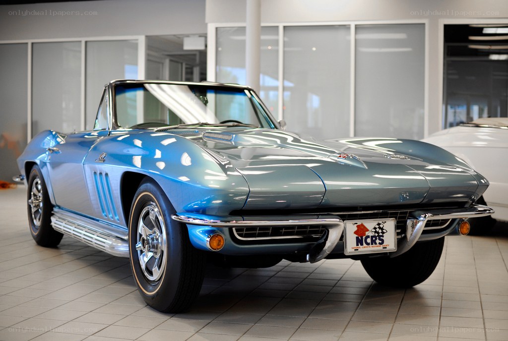 Blue classic Corvette in showroom