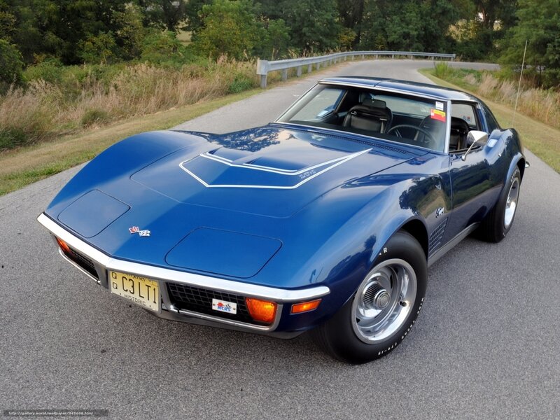 Blue classic Corvette on a road