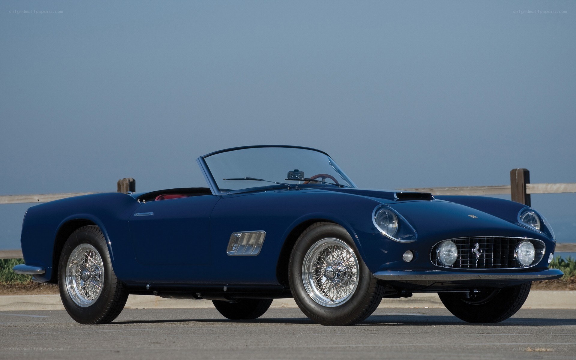 blue classic ferrari convertible