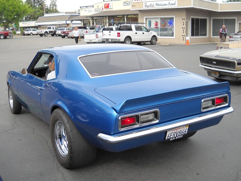 Blue classic muscle car at a show