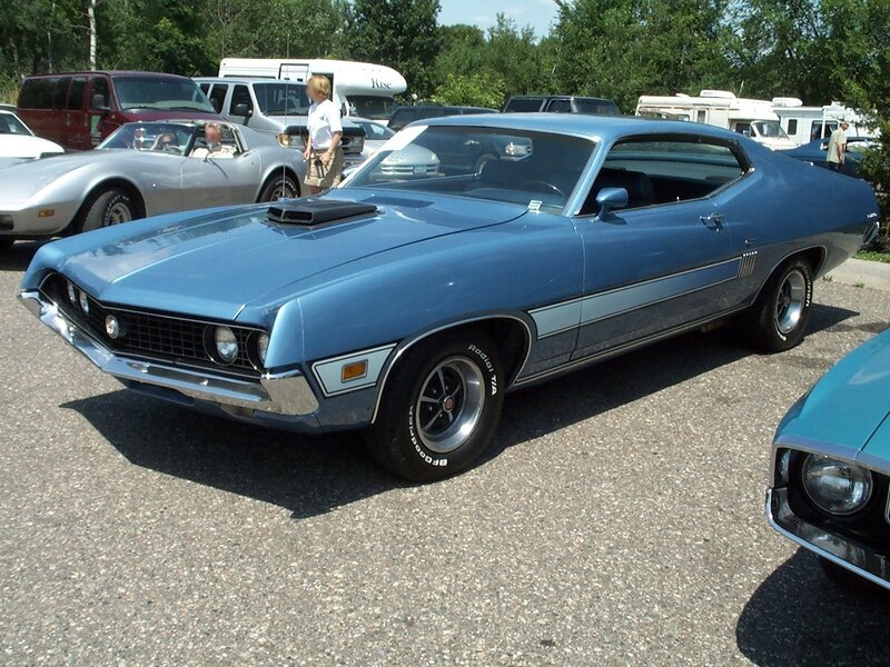Blue classic muscle car at a show