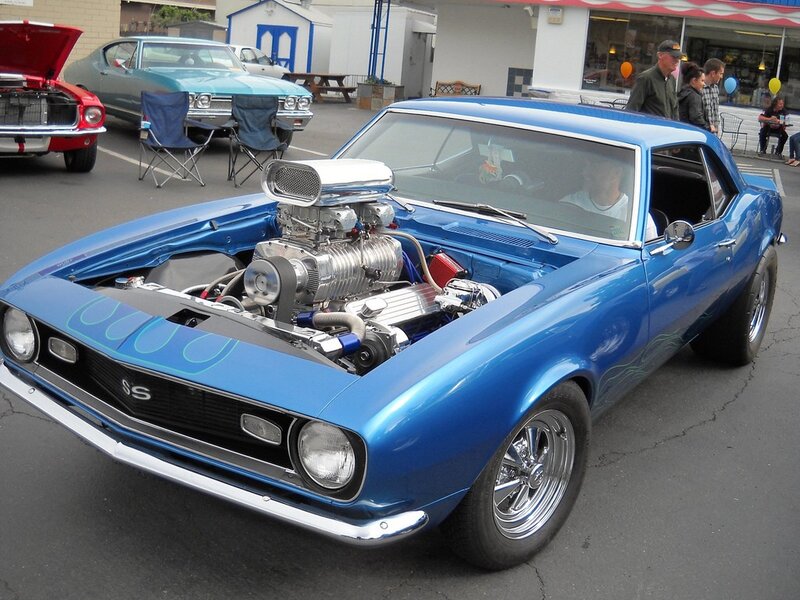 Blue classic muscle car at a show