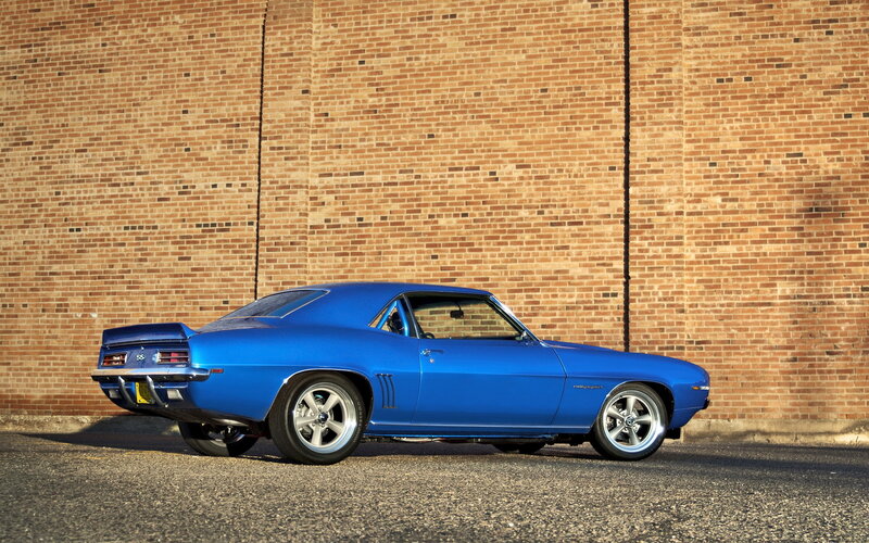 Blue Classic Muscle Car — Dramatic, Afternoon, Photograph, Brick Wall