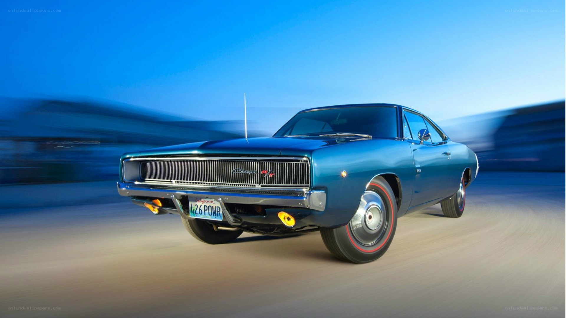 Blue classic muscle car in motion