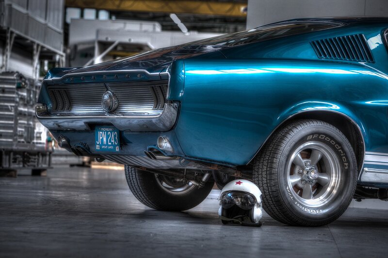 Blue classic Mustang in garage