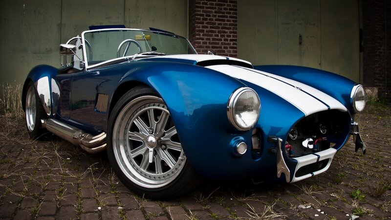 Blue Classic Sports Car — Dramatic, Photograph, Brick Wall