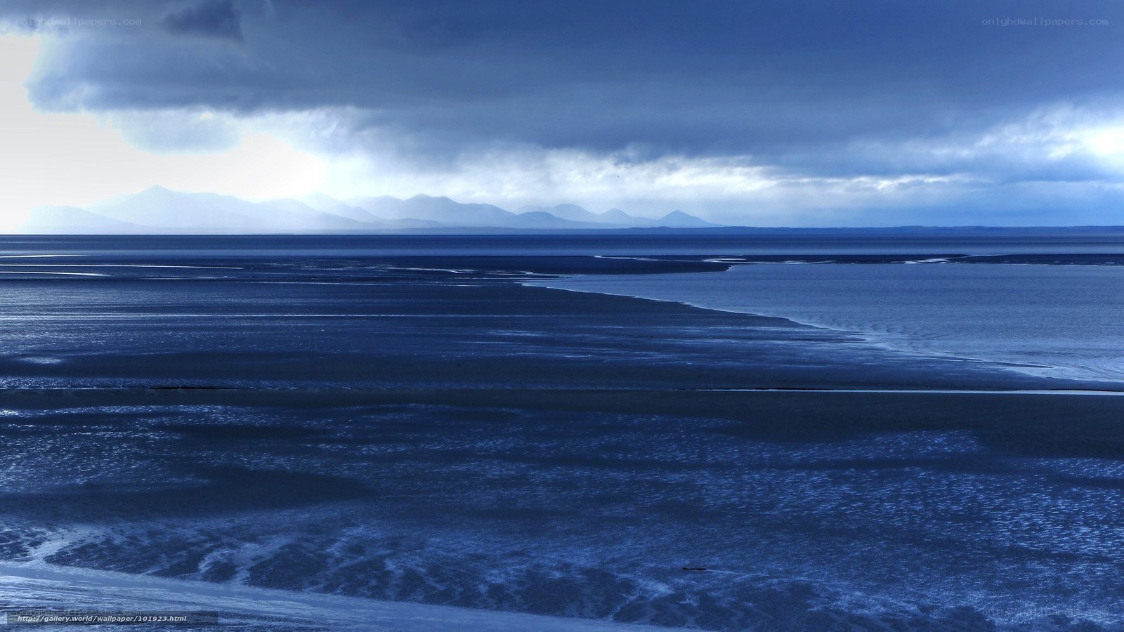 Blue coastal landscape at dusk