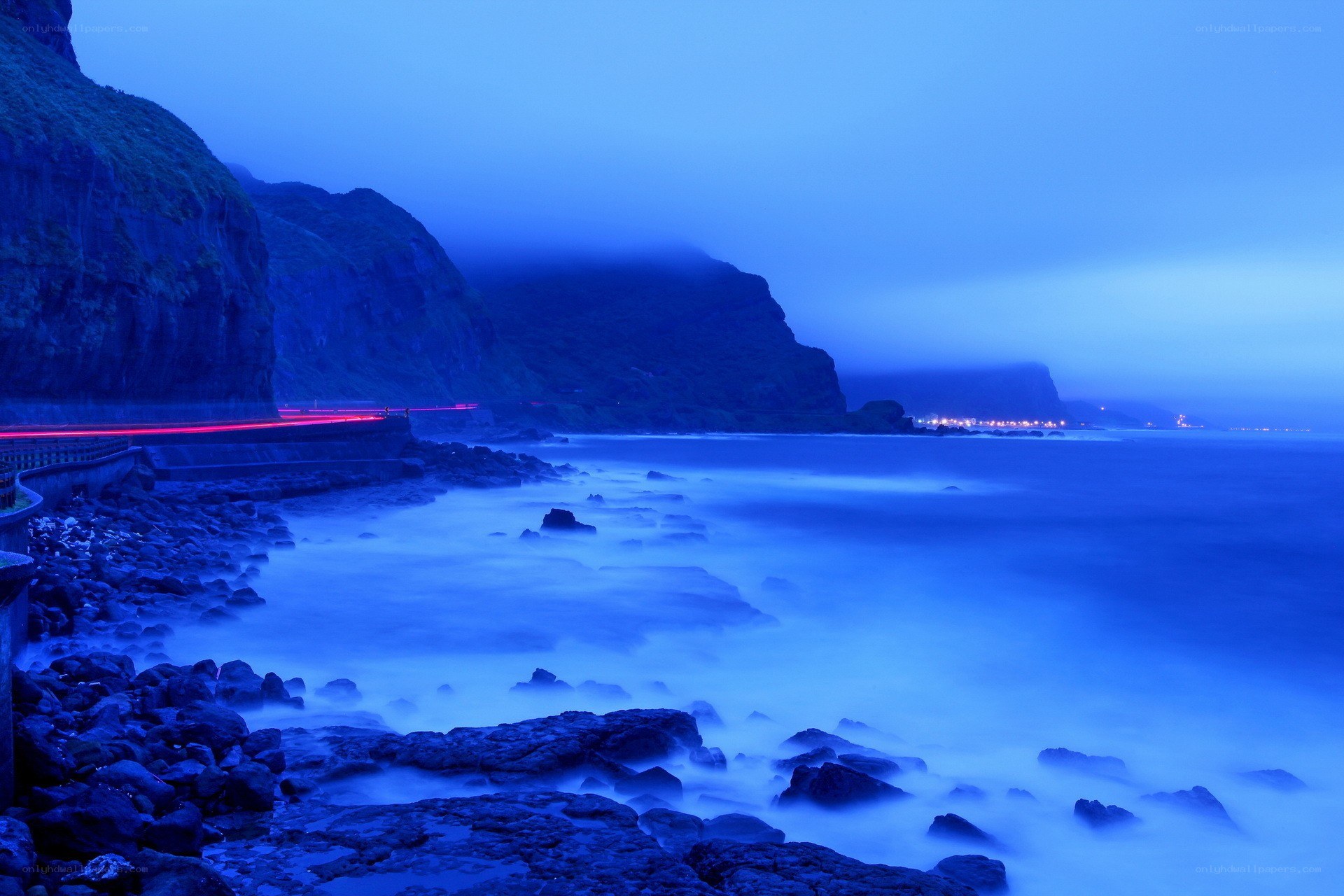 Blue coastal night scene