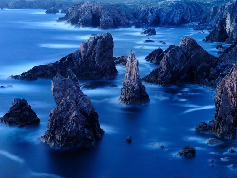 Blue coastal rock formations