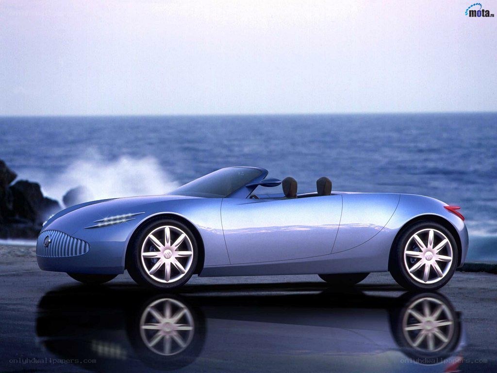 Blue concept car by the sea