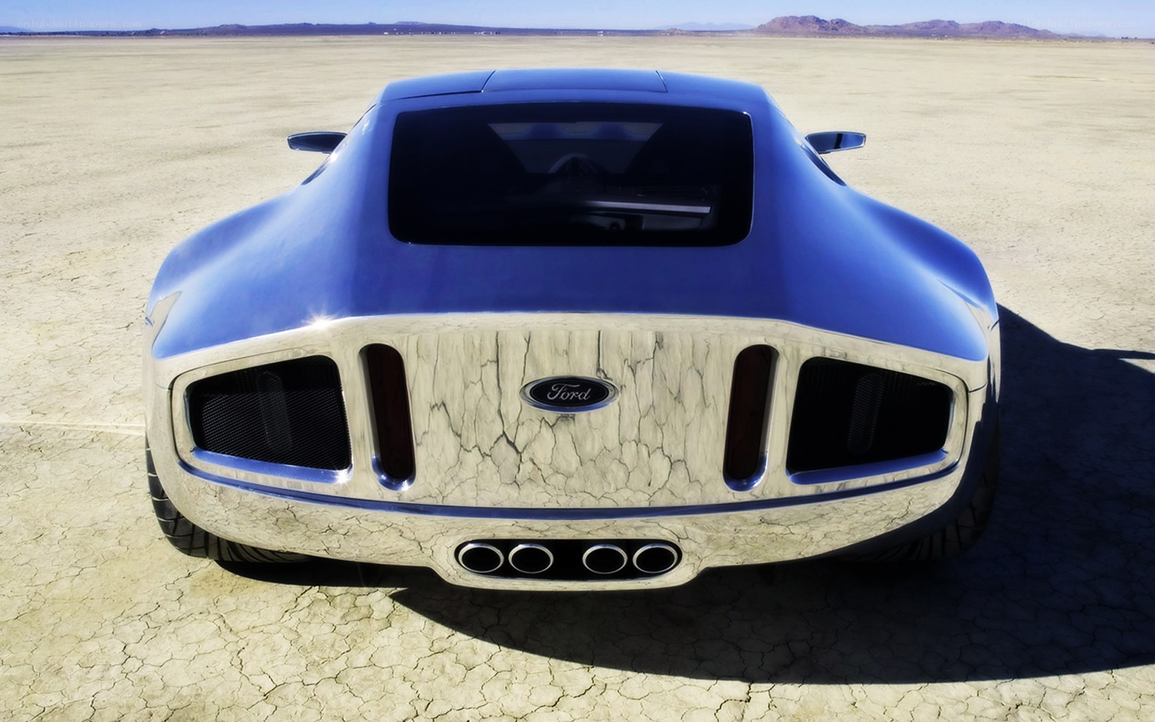 blue concept car in desert